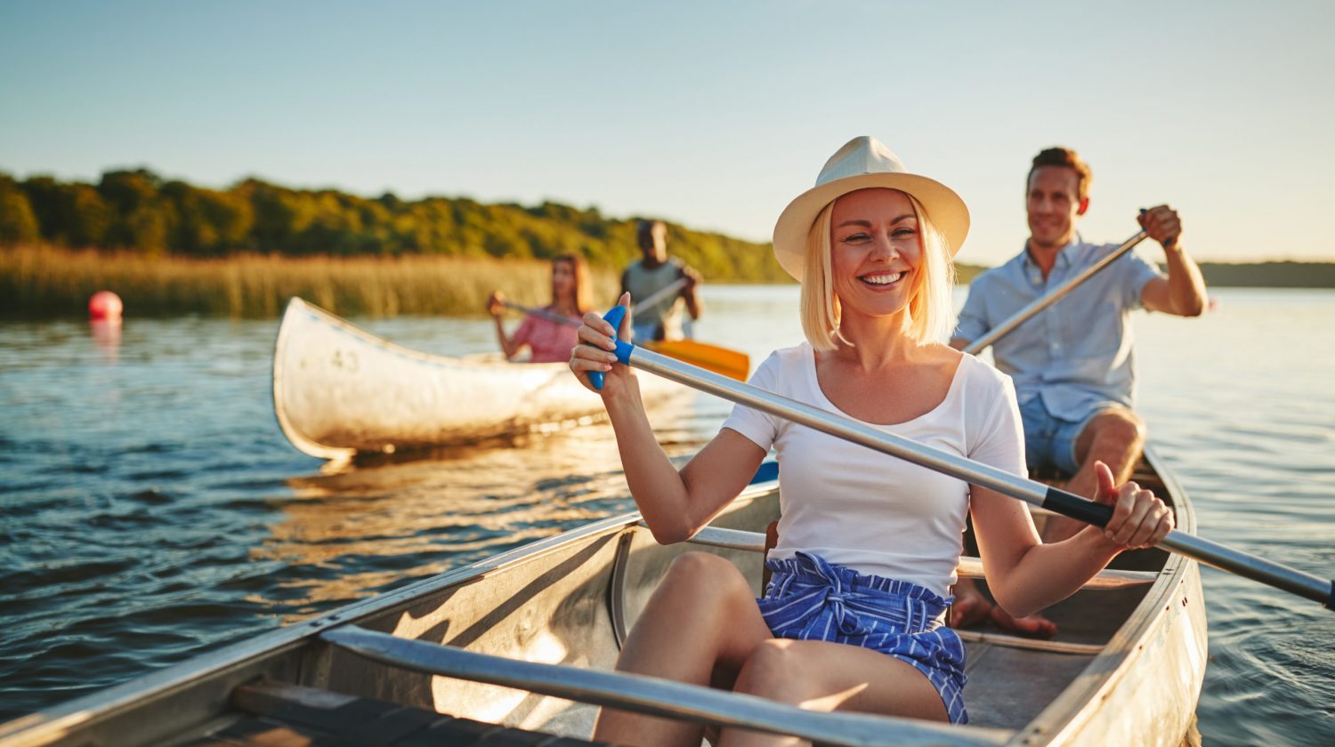 young couple enjoying a canoe